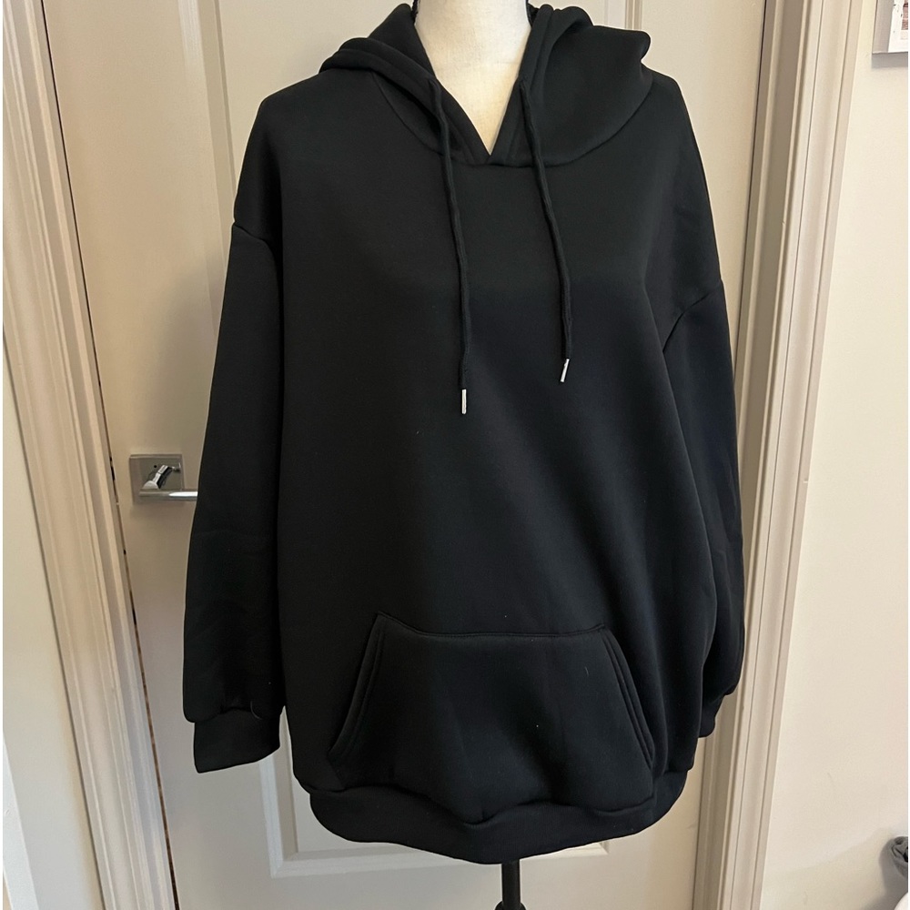 Black hoodie with drawstrings